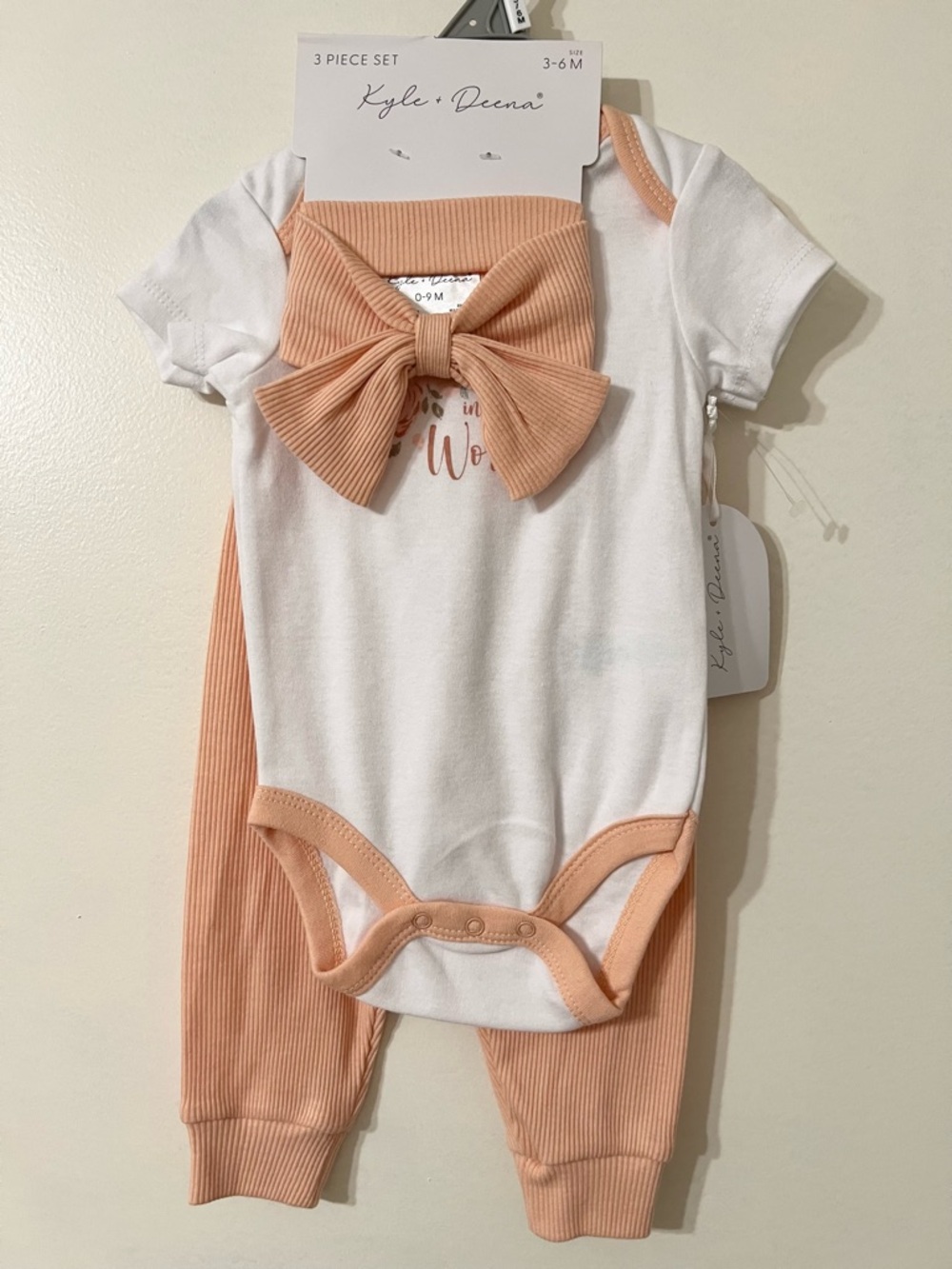 Kyle + Deena Peach & White 3-Piece Baby Outfit with Bow